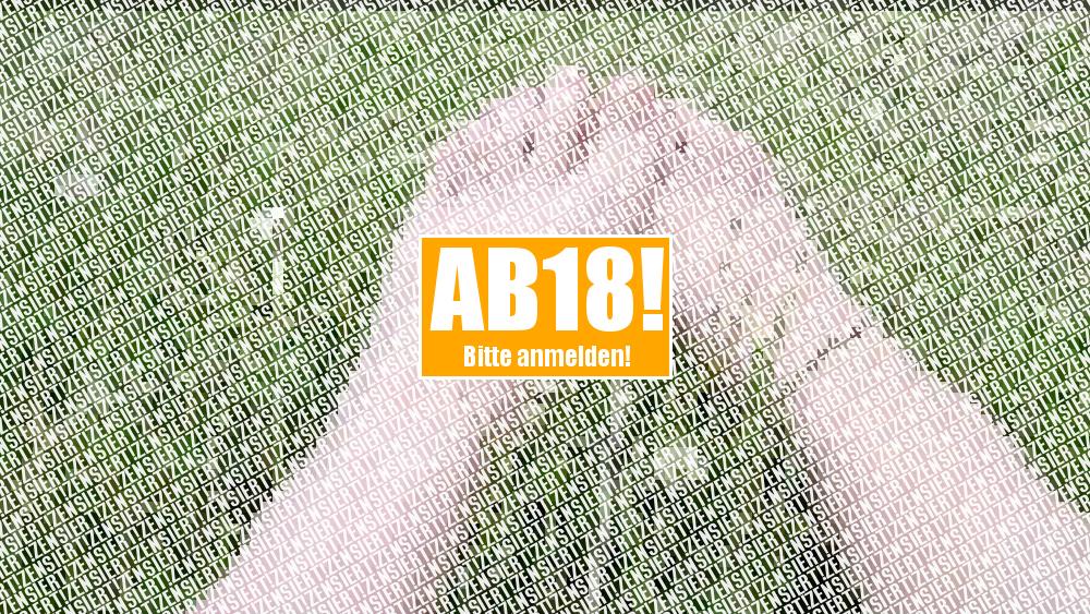 Nackte Füße im Gras